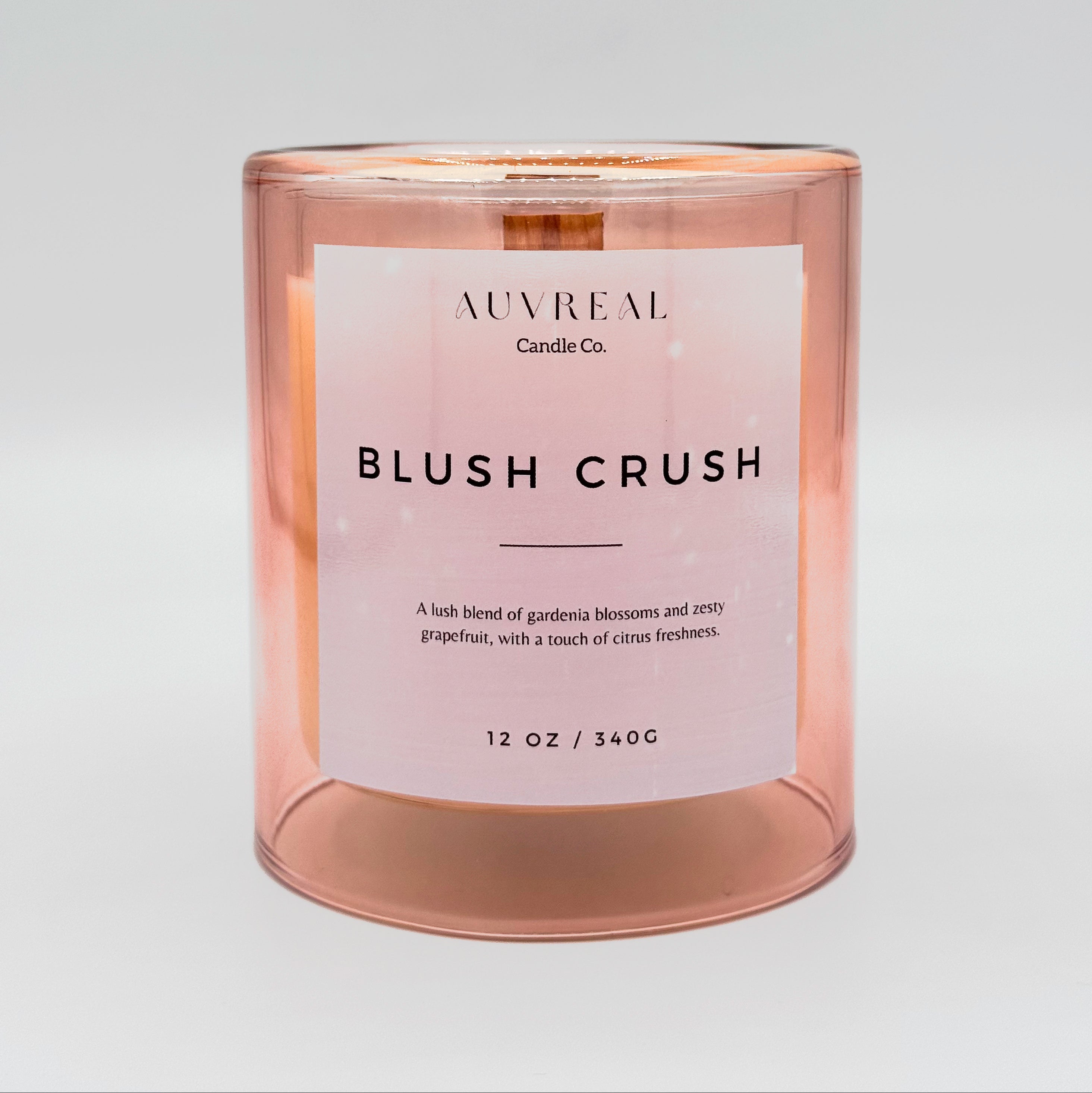 luxury candle blush crush by auvreal candle co. is a lush blend of gardenia blossoms and zesty grapefruit with a touch of citrus freshness.