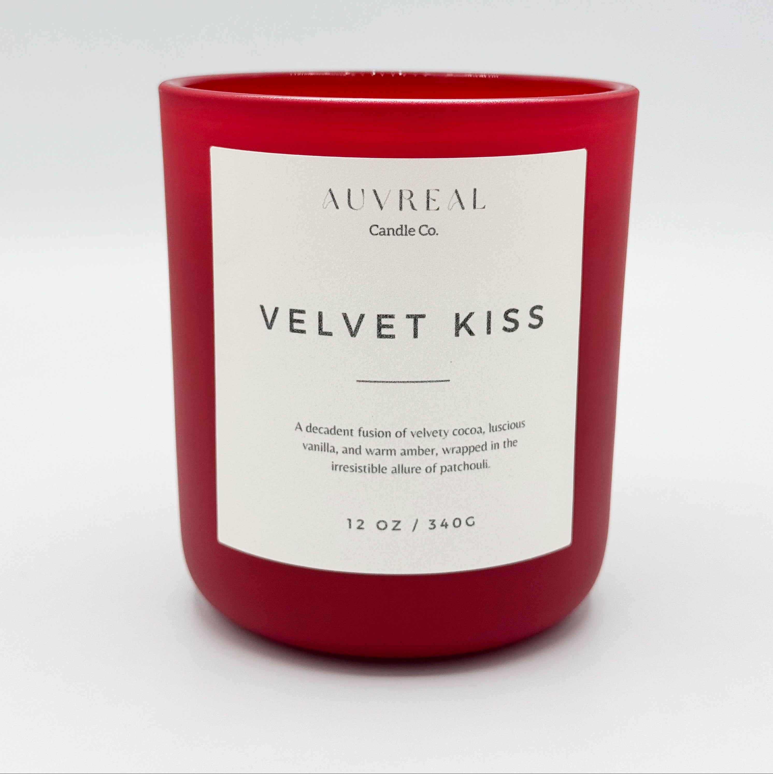 velvet kiss luxury candle by auvreal candle co. is a decadent fusion of velvety cocoa, luscious vanilla and warm amber, wrapped in the irresistible allure of patchouli.